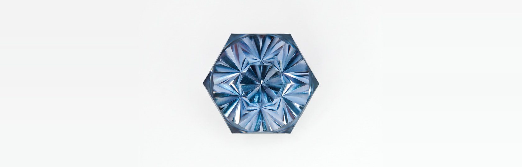 A natural sapphire, 4.03 ct, a hexagonal concave brilliant, face-up